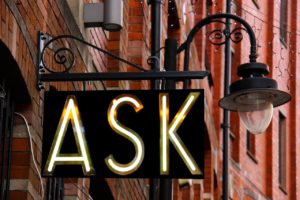 Picture of a sign showing the word, ASK.